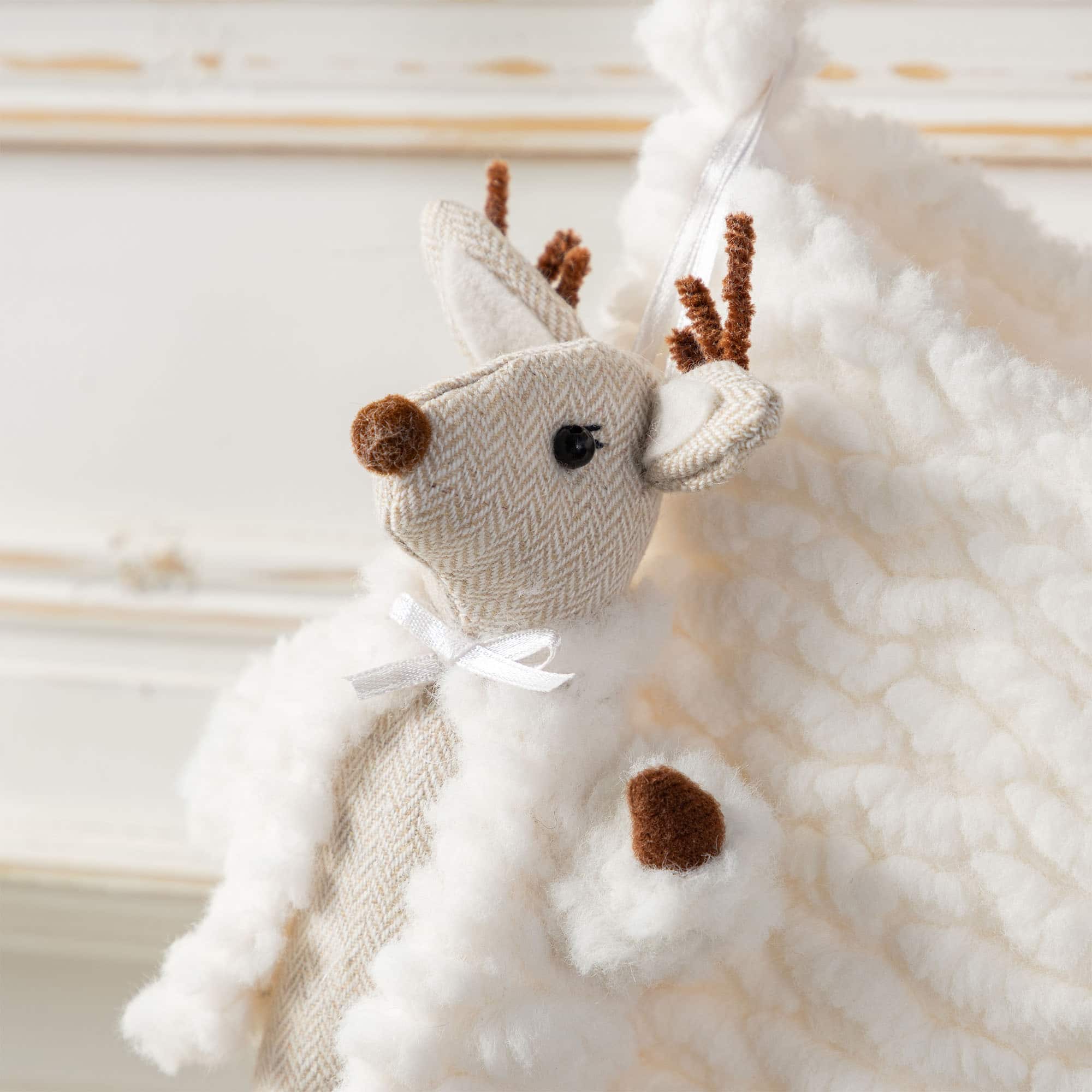 Glitzhome® 21"L White Plush Christmas Stocking with Reindeer Ornament